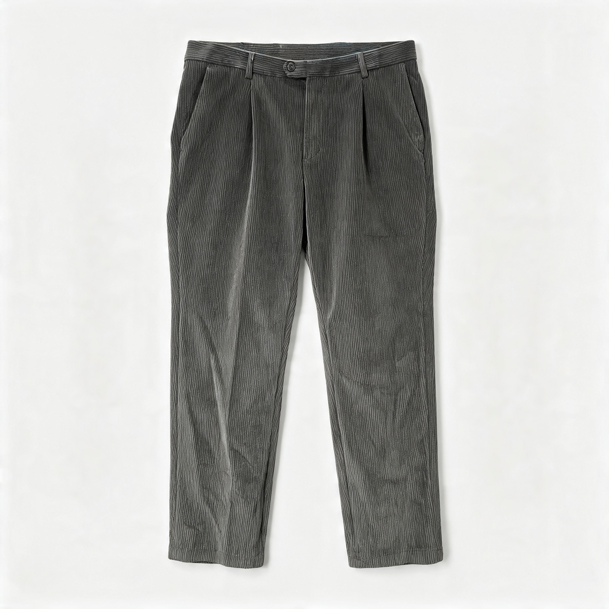 Black corduroy pants with decorative buttons on a white background