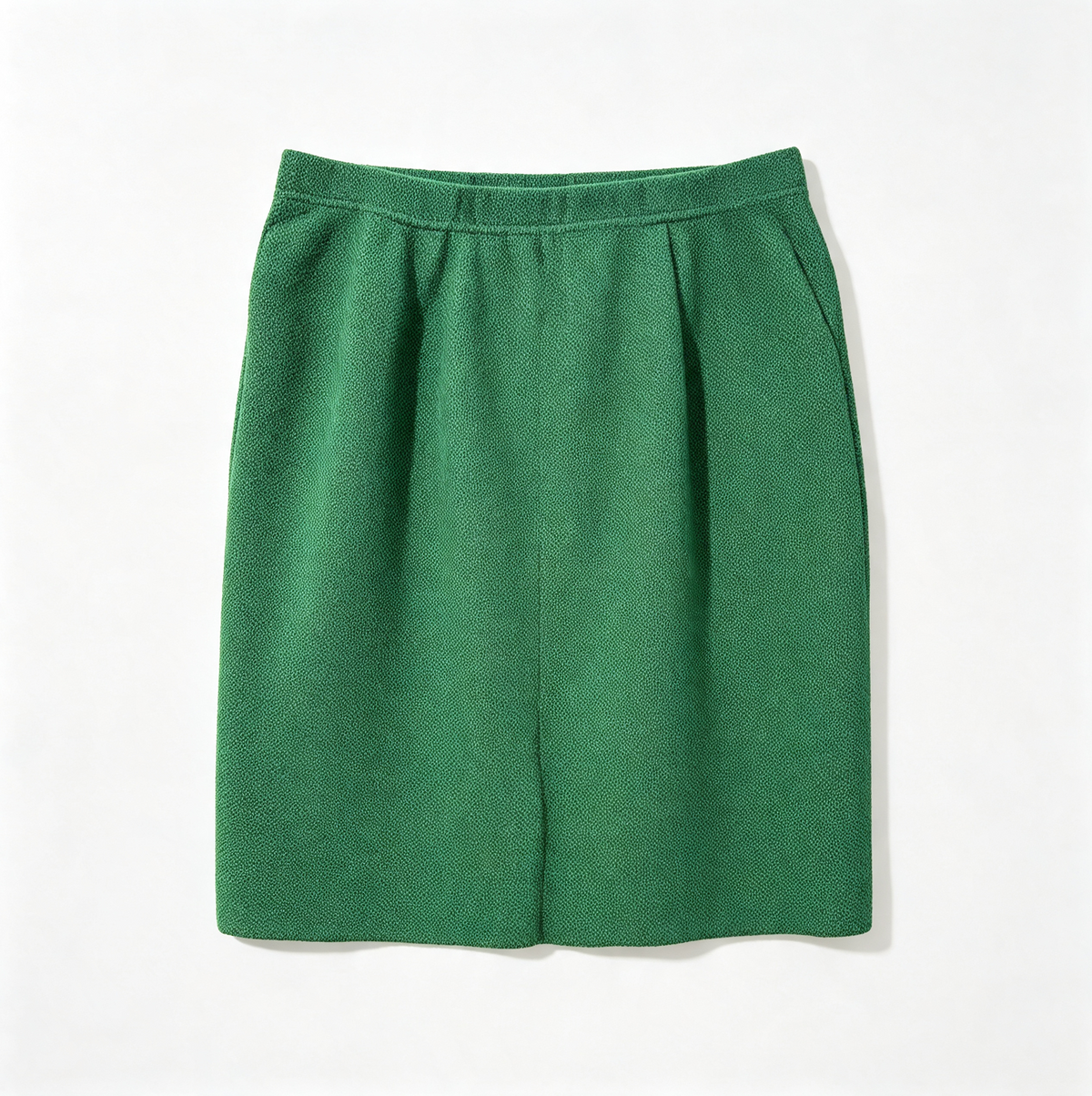 A green pleated skirt with a wide waistband, laid flat against a clean white background.