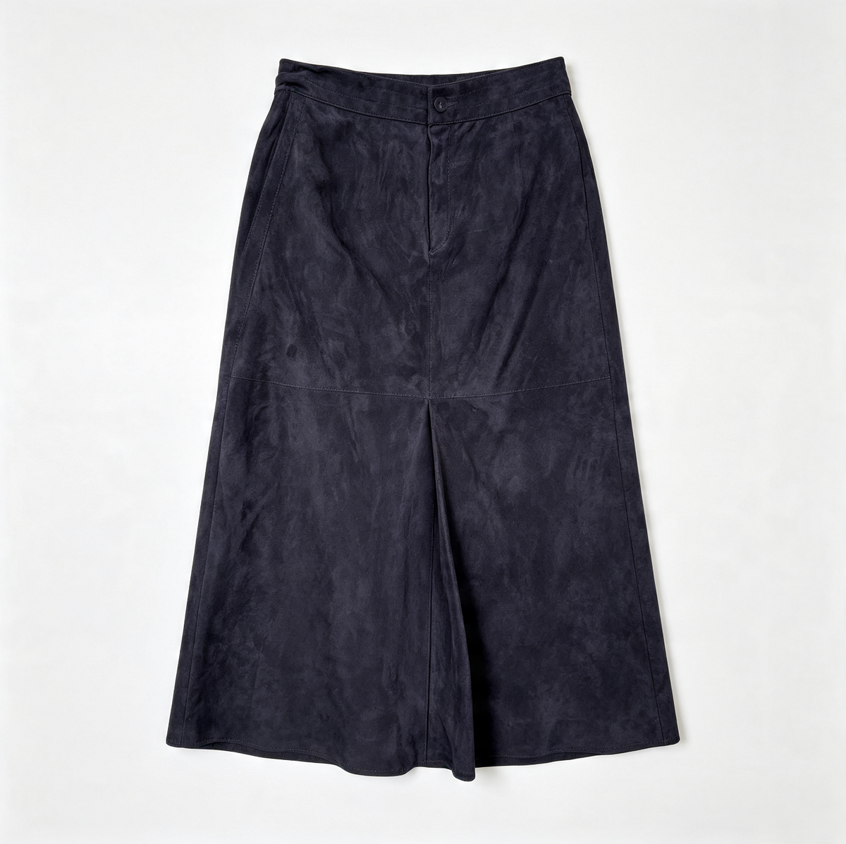 A dark navy blue suede skirt with a front button closure and a subtle vertical seam detail, laid flat against a light off-white background.