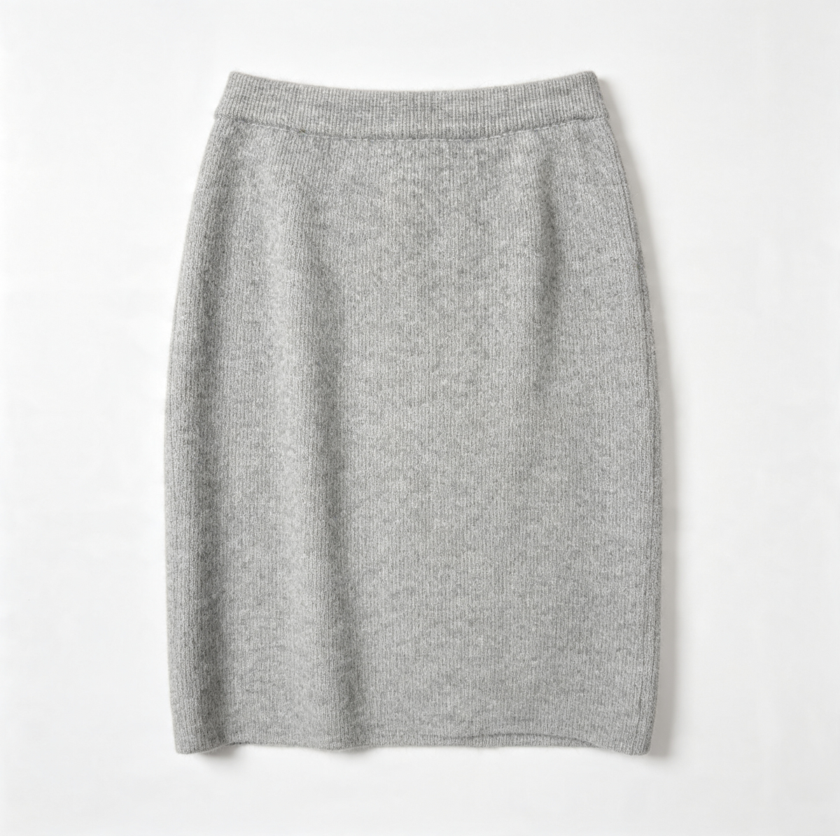 A light gray ribbed knit wool pencil skirt with a wide elastic waistband, laid flat against a clean white background.