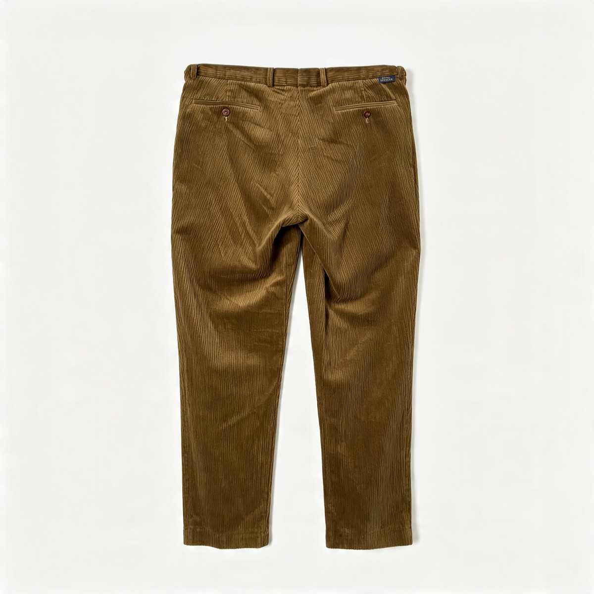 A pair of olive brown corduroy trousers shown from the back, laid flat against a clean white background.
