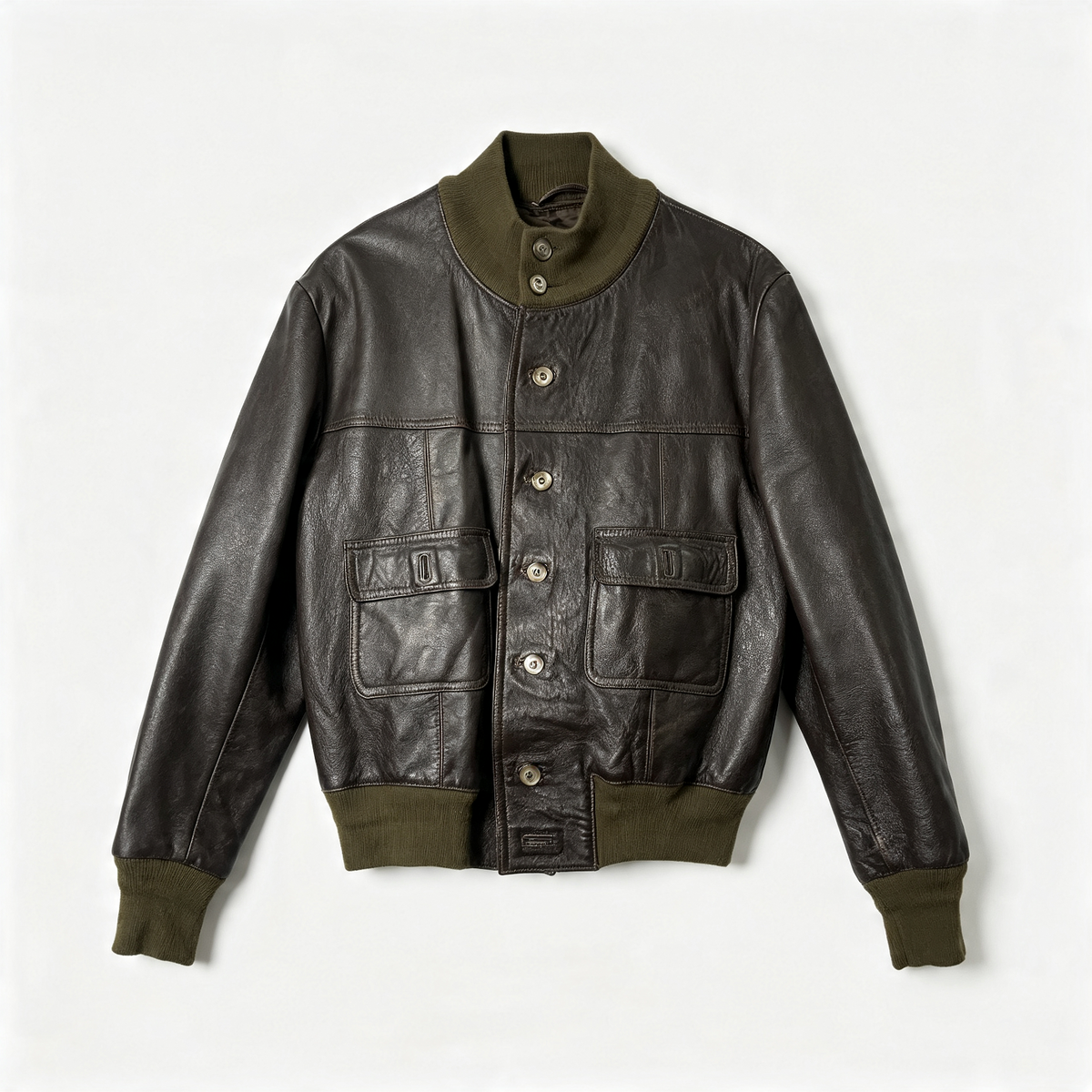 An olive green leather jacket with a matching green ribbed collar, cuffs, and hem, featuring a button-up front and two front flap pockets, shown against a plain light background.