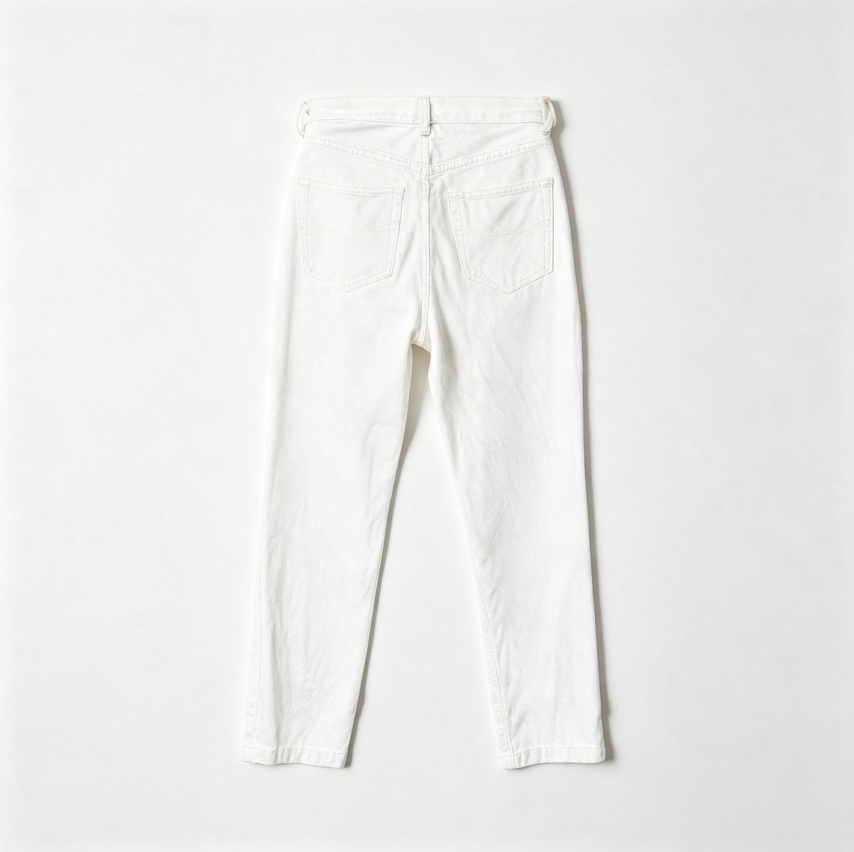 White high-waisted cropped jeans shown from the back, laid flat on a clean white background.