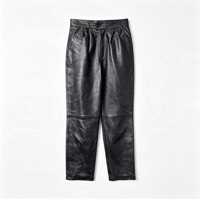 Black leather pants with a high waist and front pleats, laid flat on a white background.