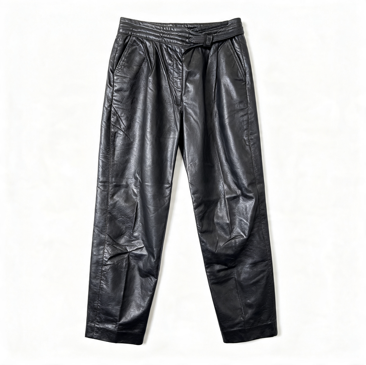 Black leather pants with an elastic waistband and tie belt, laid flat on a white background.