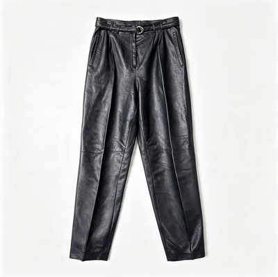Black leather trousers with a high-waisted, pleated front and a matching belt, laid flat on a light off-white background.