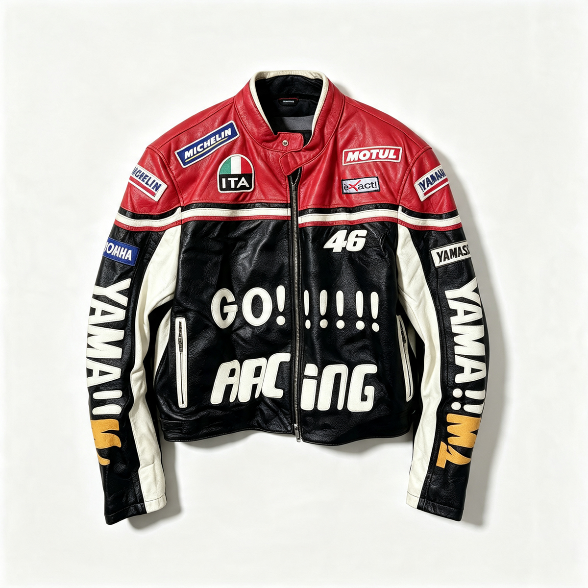 A leather motorcycle racing jacket with a red and black color-blocked design, featuring sponsor logos like Michelin, Motul, and Yamaha, and the number 46 on the front.
