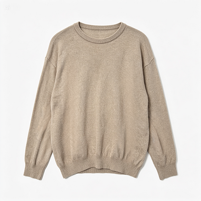 A light beige crewneck knit sweater with long sleeves and a relaxed fit, laid flat against a clean white background.
