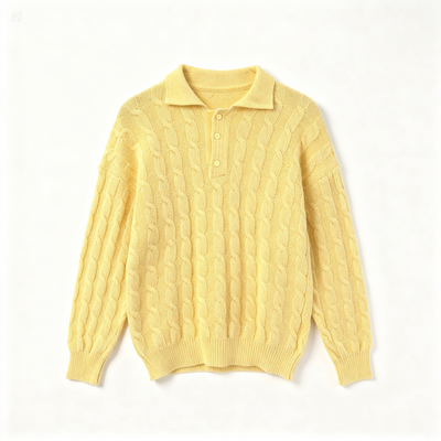 A pale yellow cable-knit polo sweater with a three-button placket, laid flat against a clean white background.