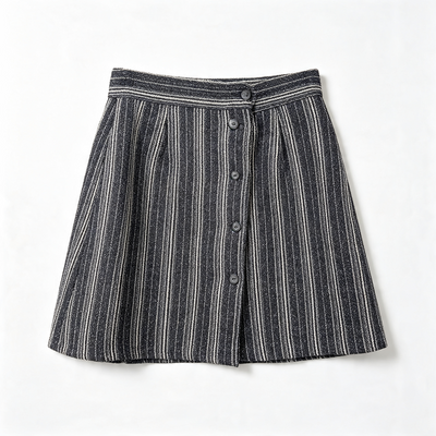 A black and white vertically striped pleated wool mini skirt with a button-up front, shown flat against a white background.